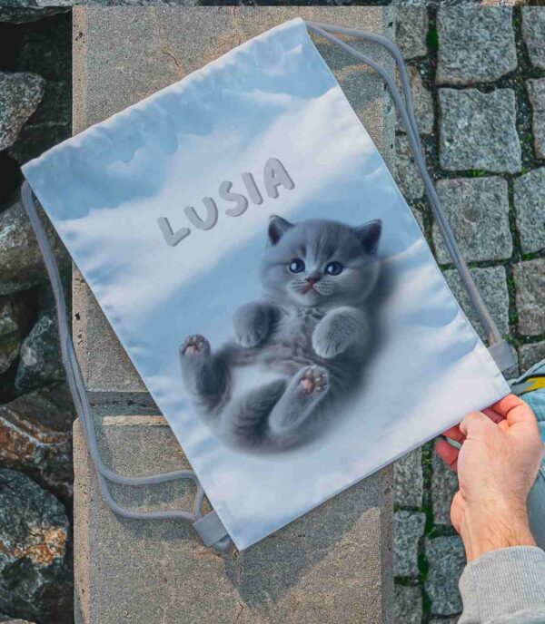 Workoplecak imienny leżący kot